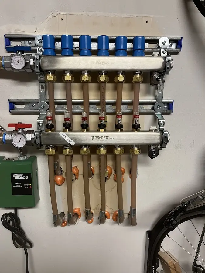 Plumber performing Water Heater Repair at a residential property in Pooler